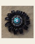 Black Daisy Flower With Antique Silver Teal and AB 1" Concho on a warm cream background