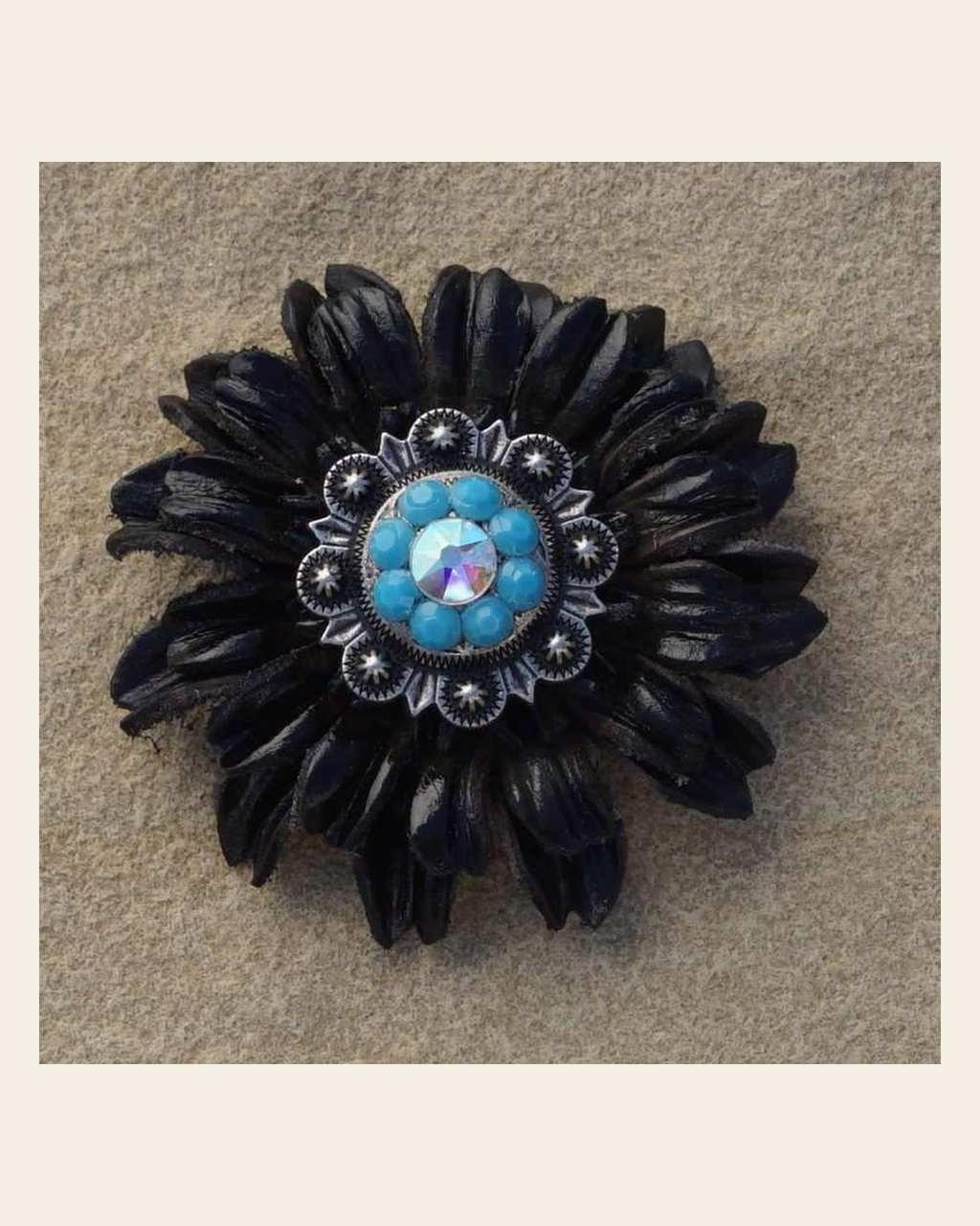 Black Daisy Flower With Antique Silver Turquoise & AB 1" Concho on a warm cream background