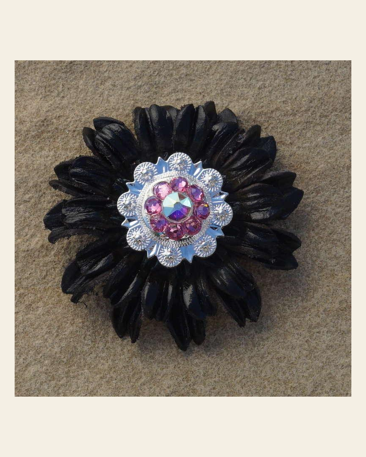 Black Daisy Flower With Bright Silver Pink and AB 1" Concho on a warm cream background