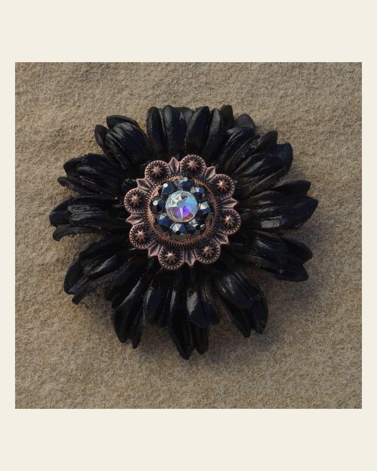 Black Daisy Flower With Copper Jet and AB 1" Concho on a warm cream background