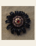 Black Daisy Flower With Copper Ruby and Champagne 1" Concho on a warm cream background