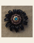 Black Daisy Flower With Copper Topaz & Champagne 1" Concho on a warm cream background