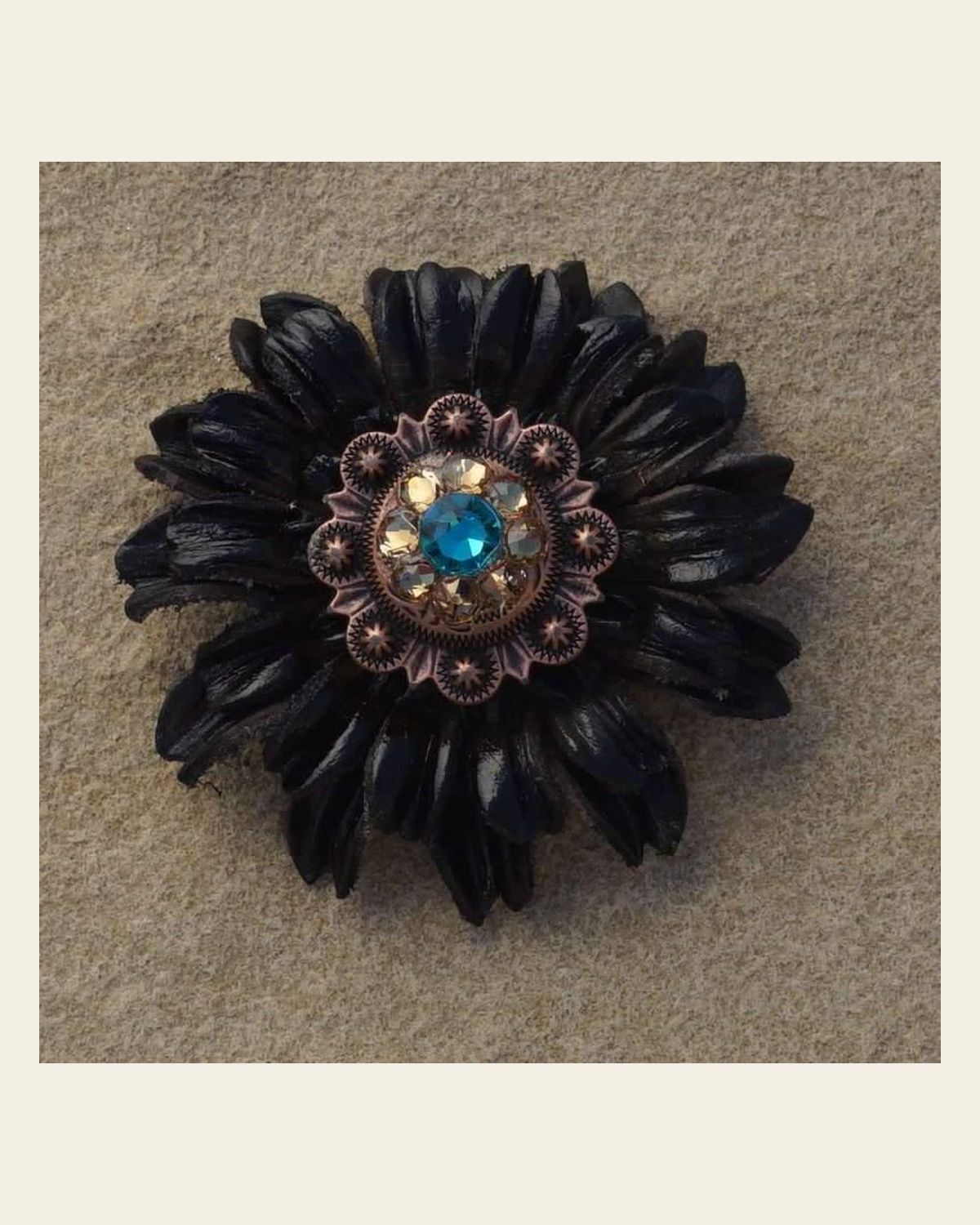 Black Daisy Flower With Copper Topaz & Champagne 1" Concho on a warm cream background