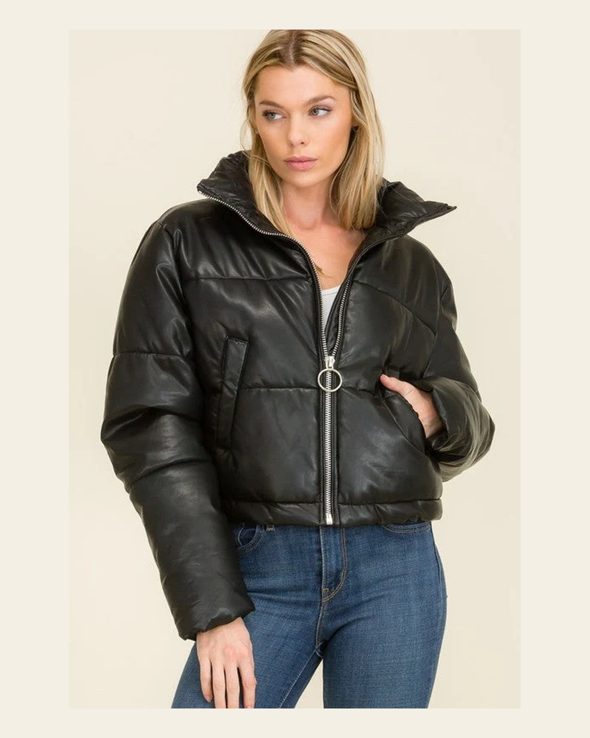 Black Faux Leather Cropped Puffer Jacket on a warm cream background
