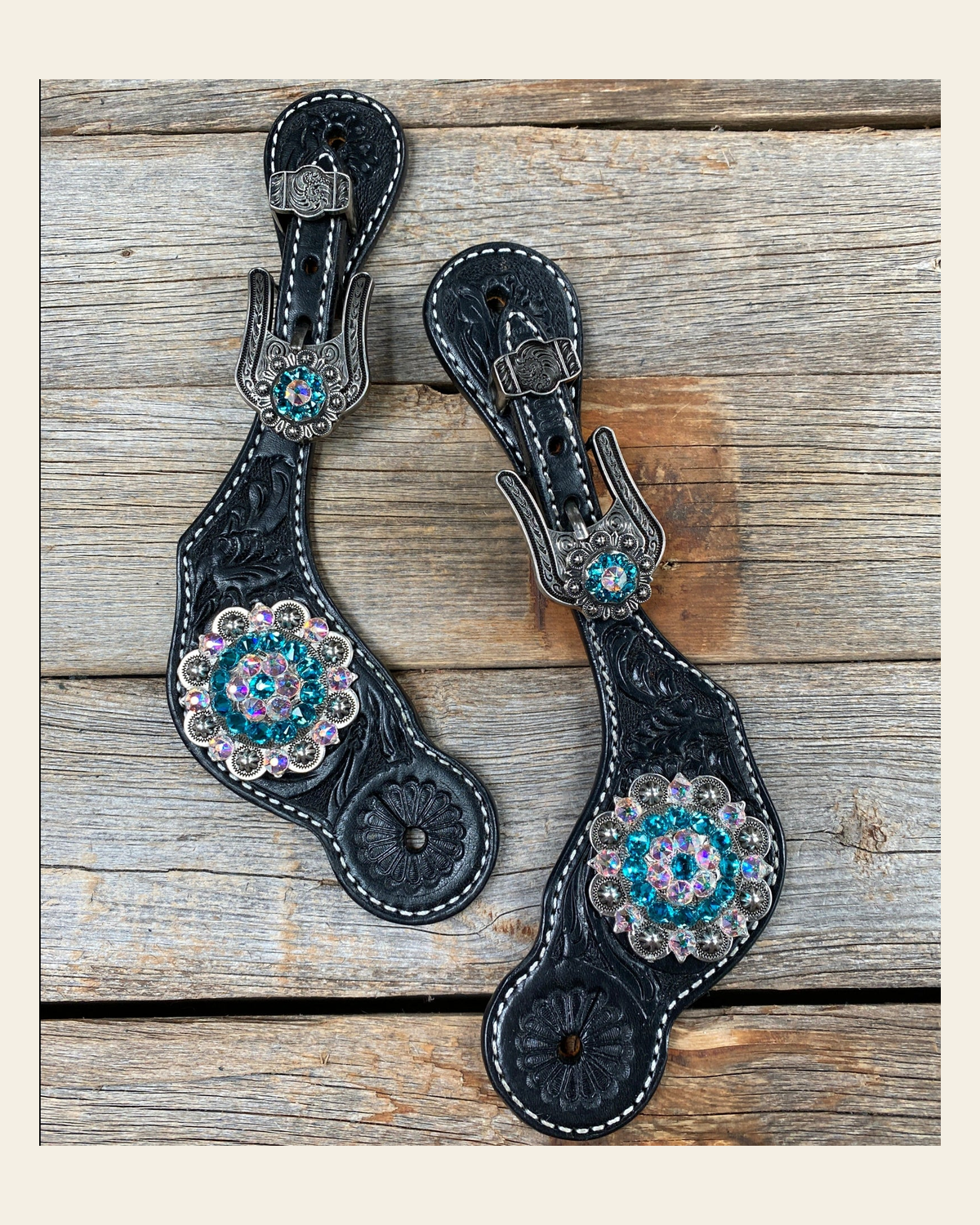 Black Floral Spur Straps - Antique Silver Crystal Conchos #SS112 on a warm cream background