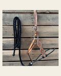Black Floral Tooled Lariat & Leather Combo Halter on a warm cream background