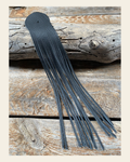 Black Leather Fringe on a warm cream background