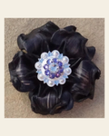 Black Gardenia Flower With Bright Silver Lilac and Clear 1" Concho on a warm cream background