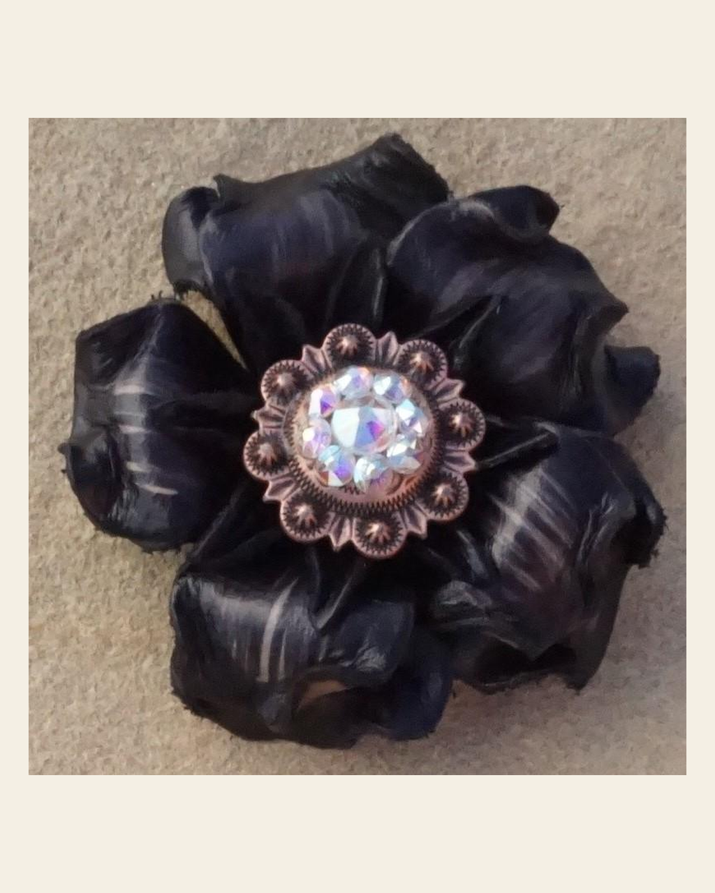 Black Gardenia Flower With Copper AB 1" Concho on a warm cream background