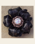 Black Gardenia Flower With Copper AB 1" Concho on a warm cream background