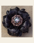 Black Gardenia Flower With Copper Jet & AB 1" Concho on a warm cream background