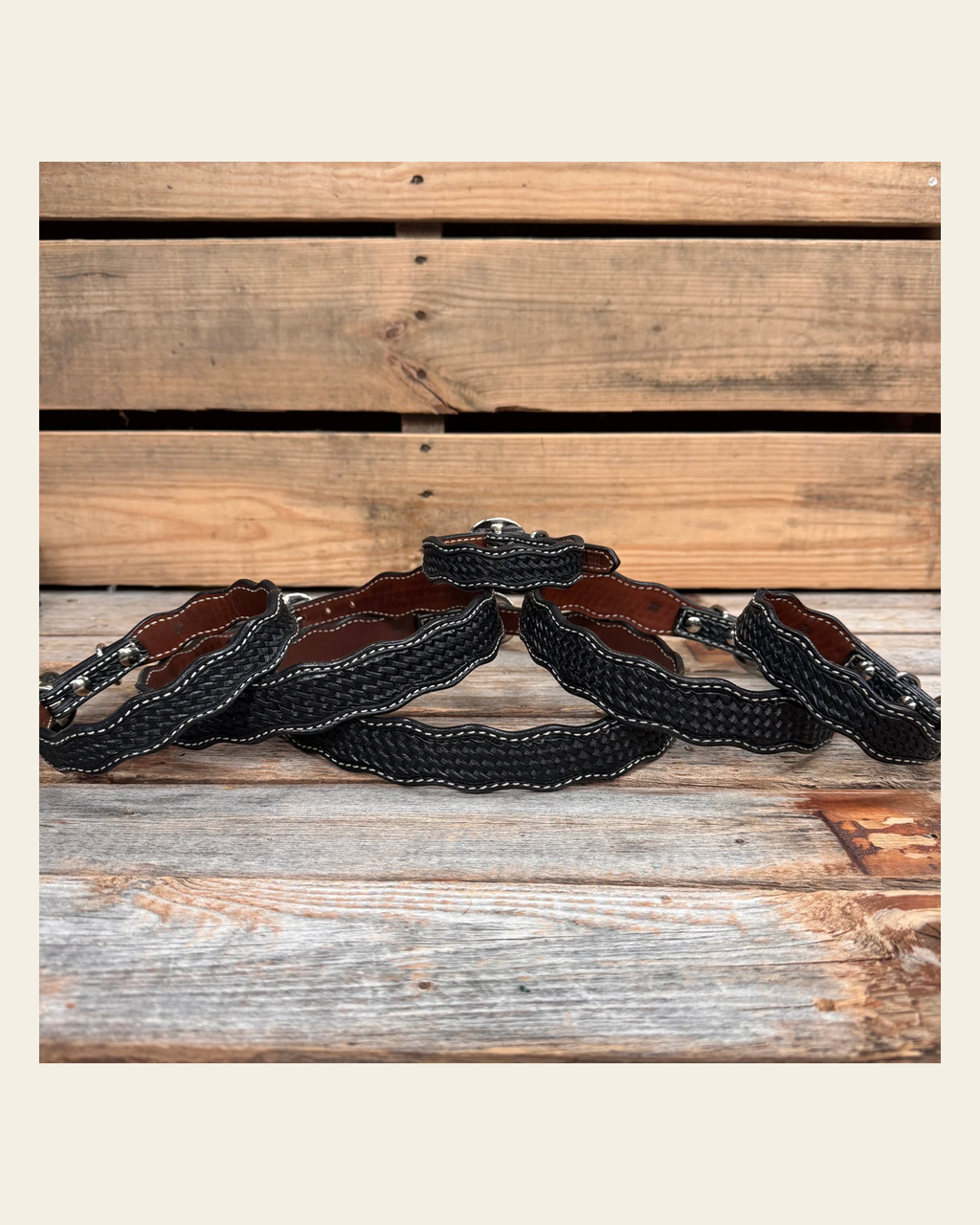 Black Genuine Leather Dog Collars Sizes 10"-28" on a warm cream background