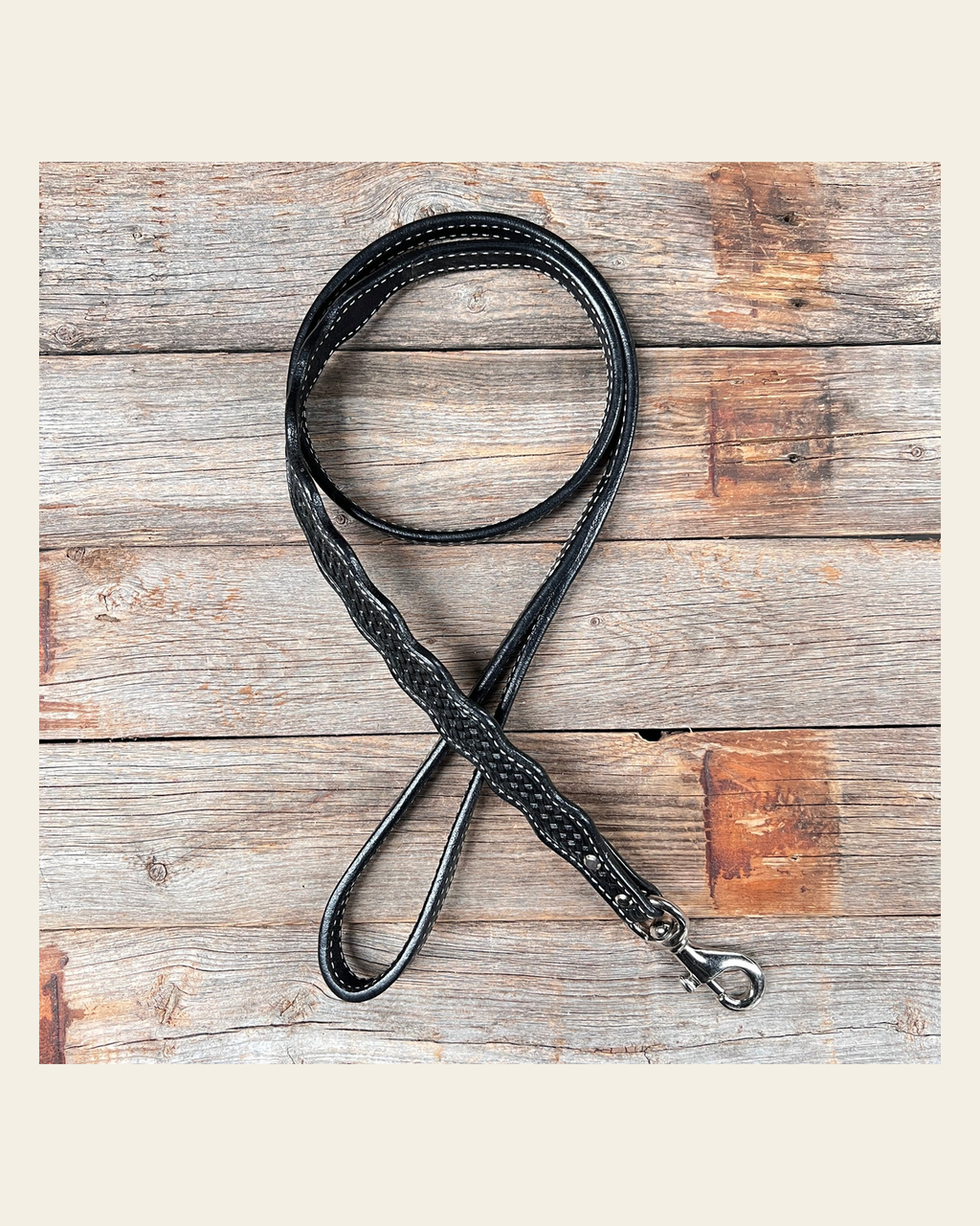 Black Genuine Leather leash 4' x 1" wide on a warm cream background