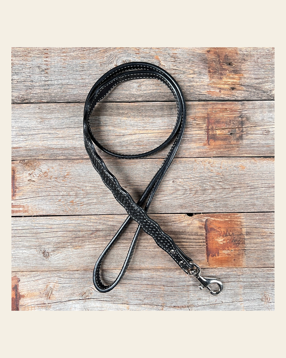 Black Genuine Leather leash 4' x 1" wide on a warm cream background