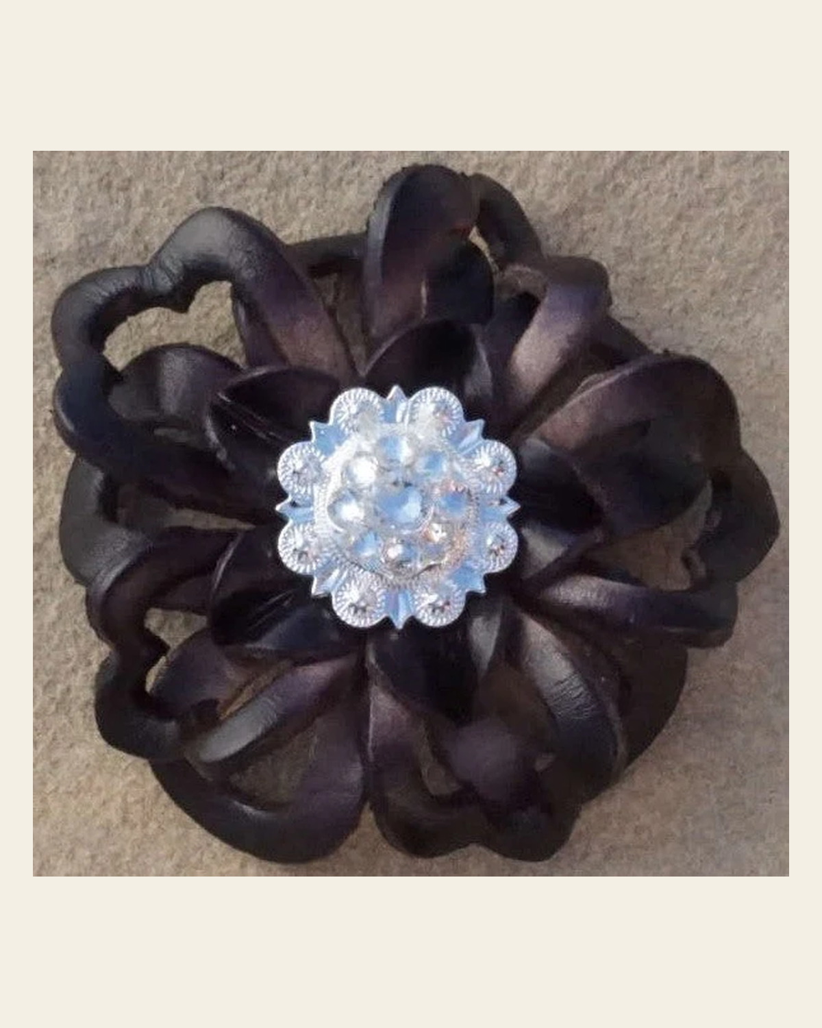 Black Lotus Flower With Bright Silver Clear 1" Concho on a warm cream background