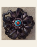 Black Lotus Flower With Copper Fire Opal and Teal 1" Concho on a warm cream background