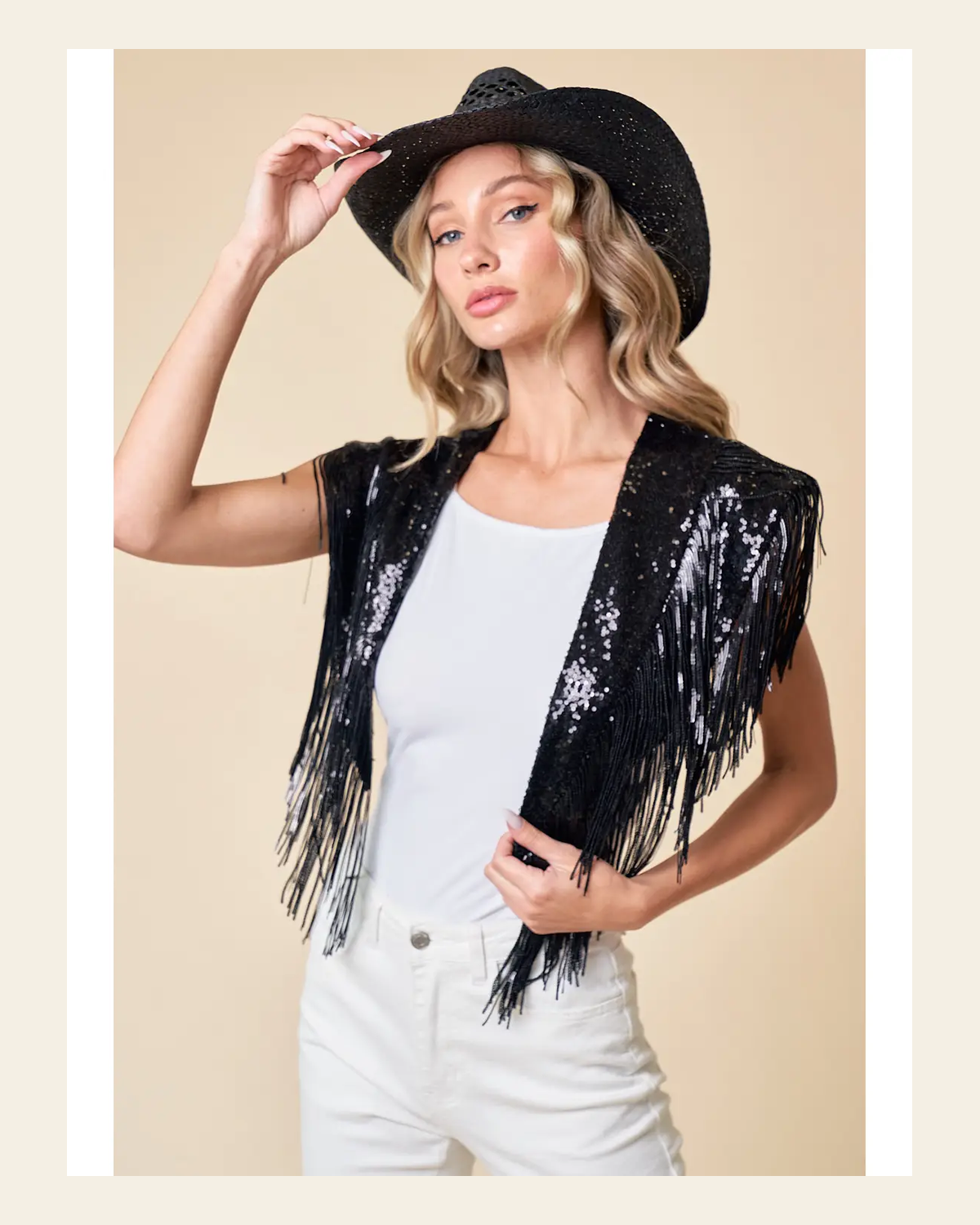 Black Sequin Fringe | Cape on a warm cream background