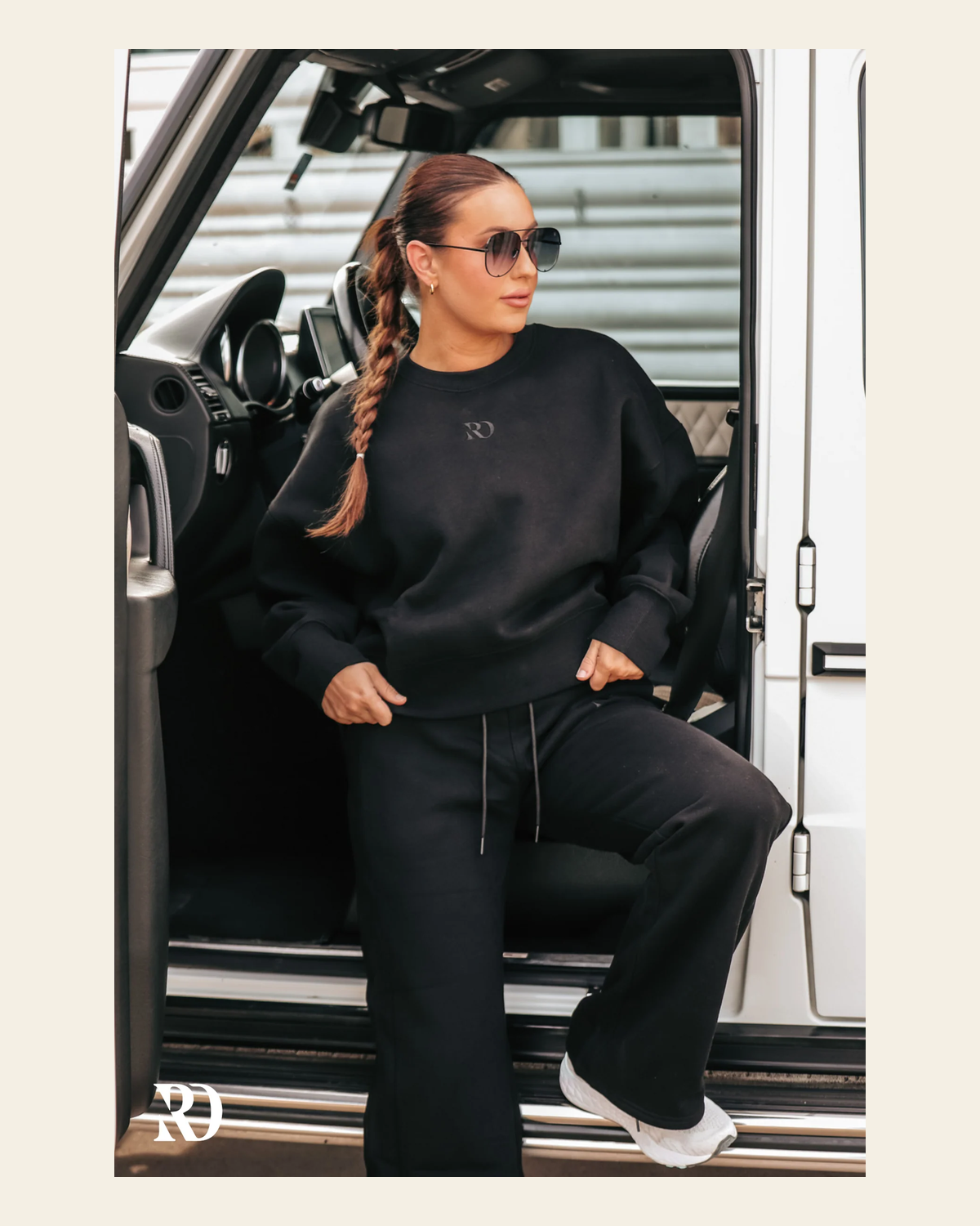 Warmup Pullover | Black on a warm cream background