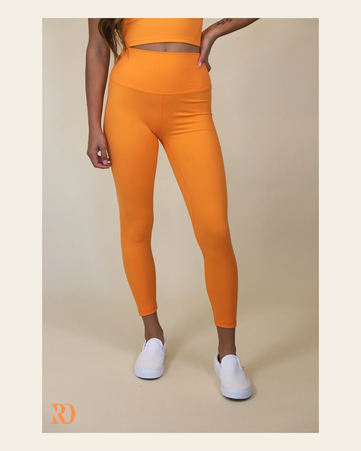 Vital Leggings | Blaze on a warm cream background