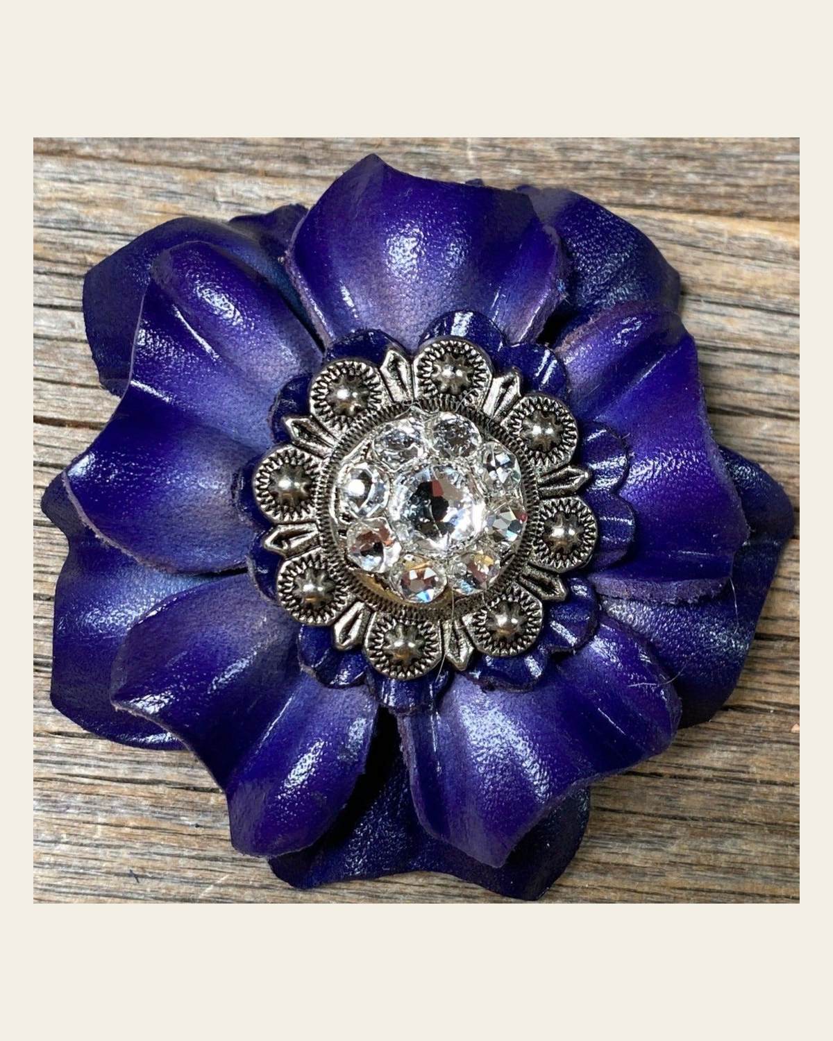Blue Carnation Flower With Antique Silver Clear 1" Concho on a warm cream background