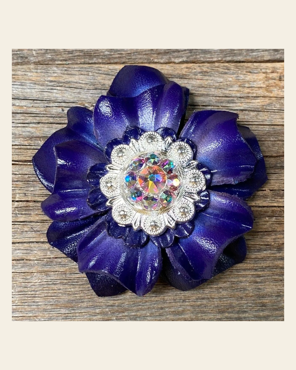 Blue Carnation Flower With Bright Silver AB 1" Concho on a warm cream background