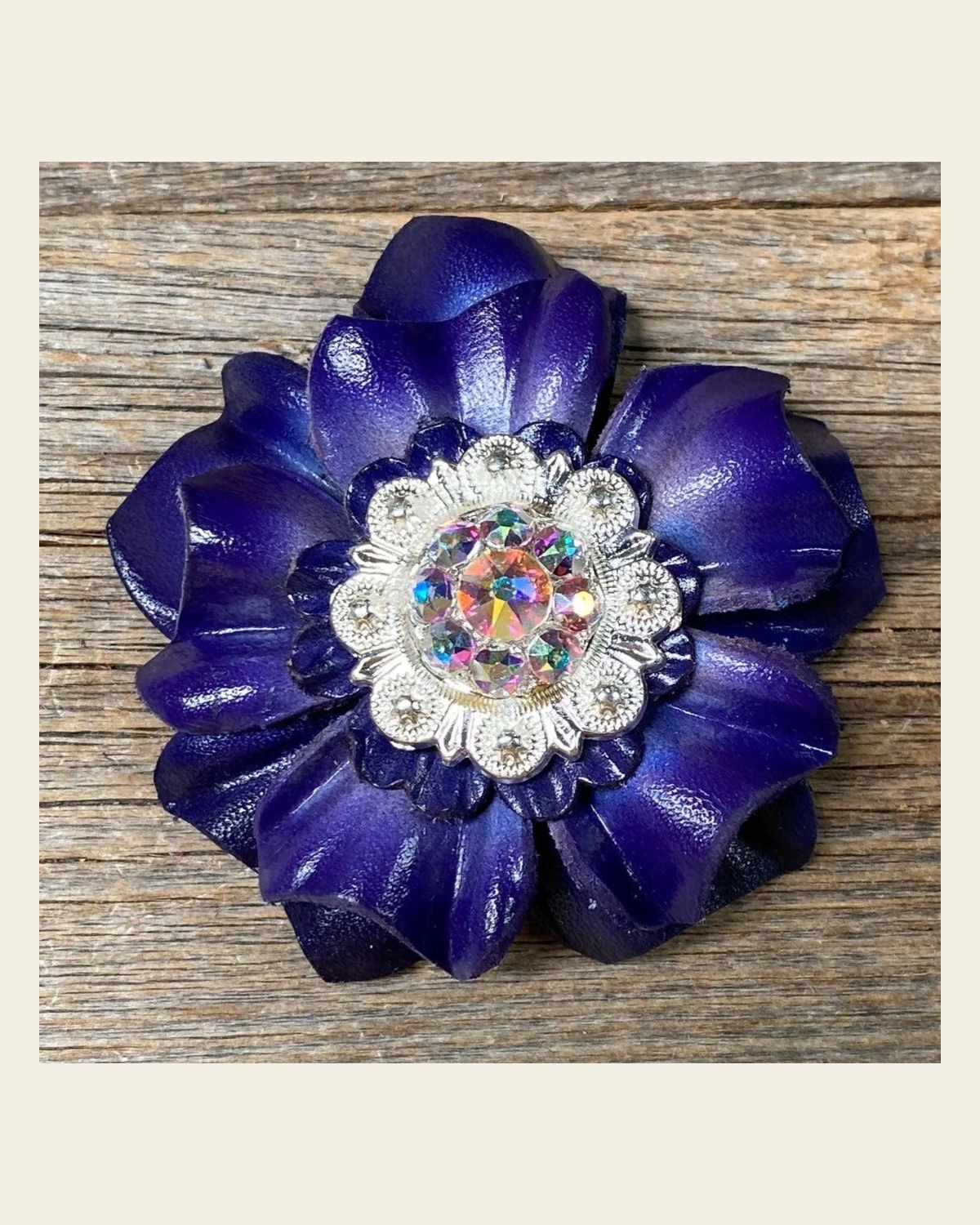 Blue Carnation Flower With Bright Silver AB 1" Concho on a warm cream background
