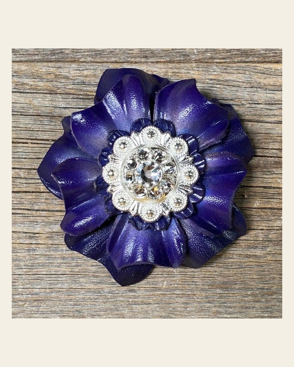 Blue Carnation Flower With Bright Silver Clear 1" Concho on a warm cream background