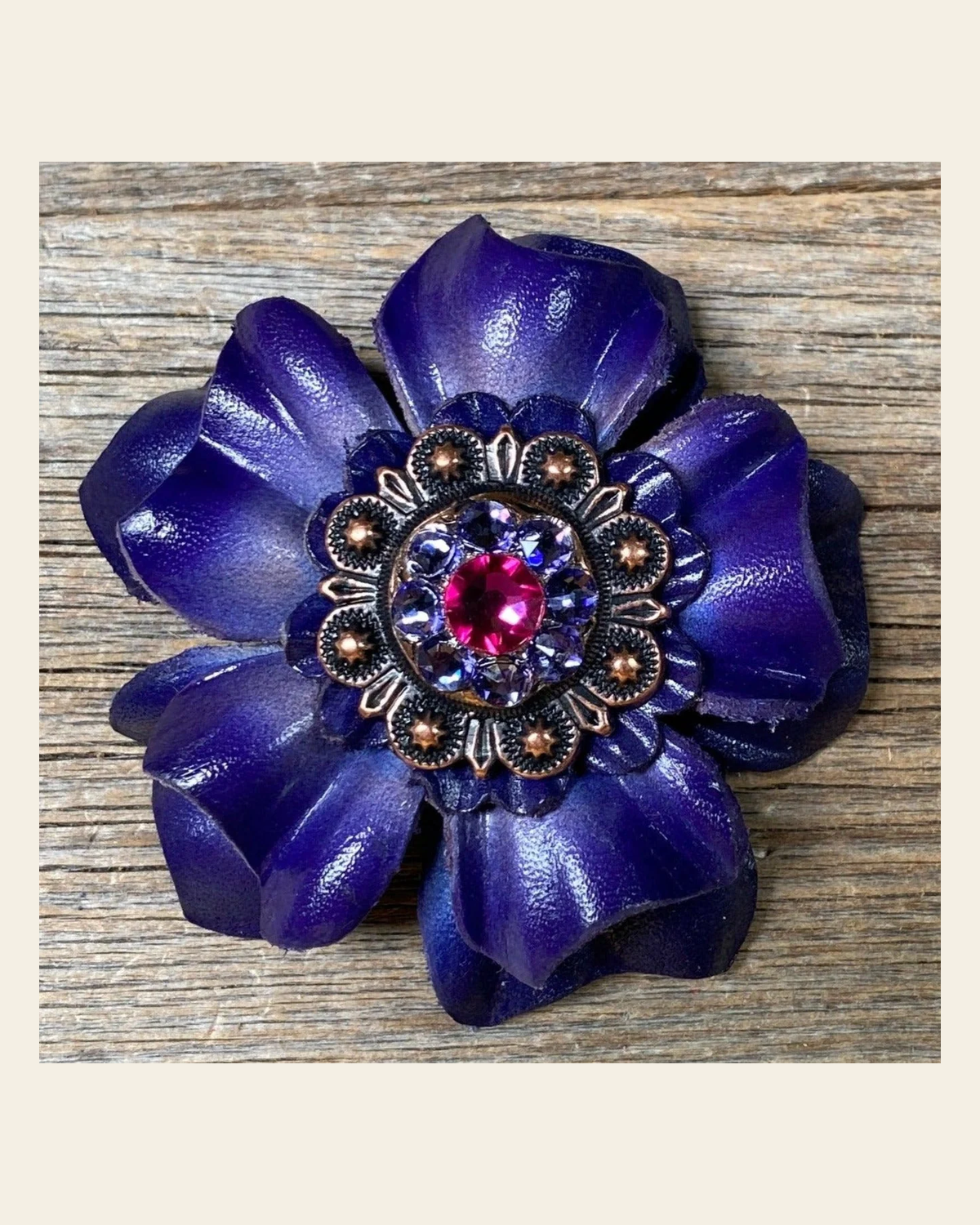 Blue Carnation Flower With Copper Fuchsia & Lilac 1" Concho on a warm cream background