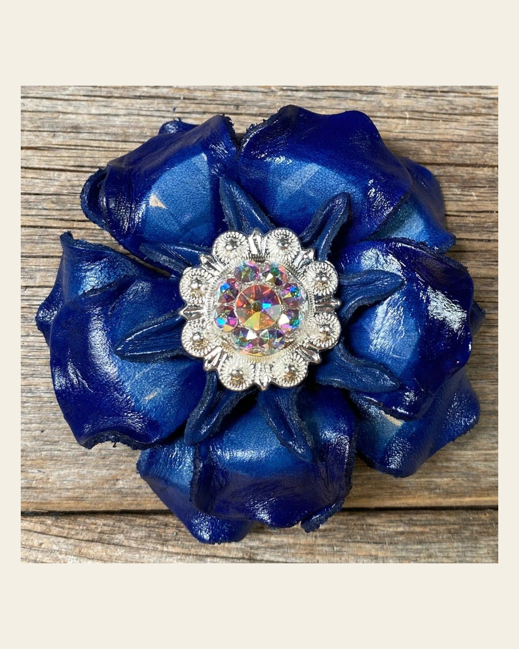 Blue Gardenia Flower With Bright Silver AB 1" Concho on a warm cream background