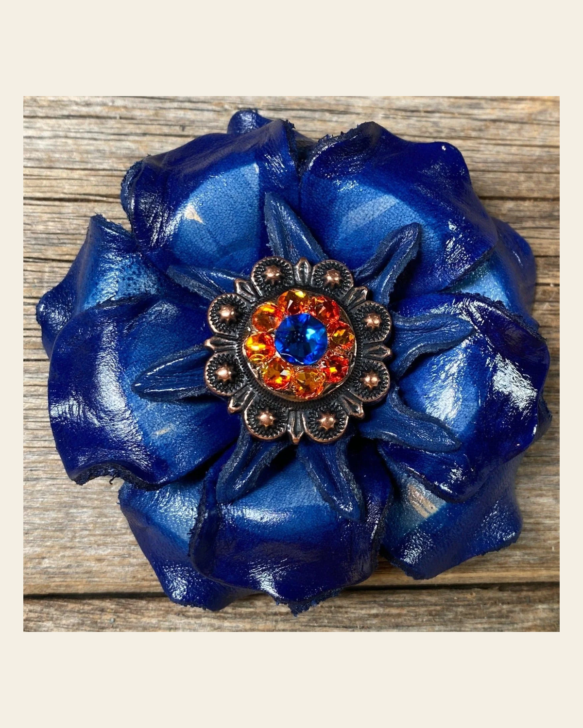 Blue Gardenia Flower With Copper Capri & Fire Opal 1" Concho on a warm cream background