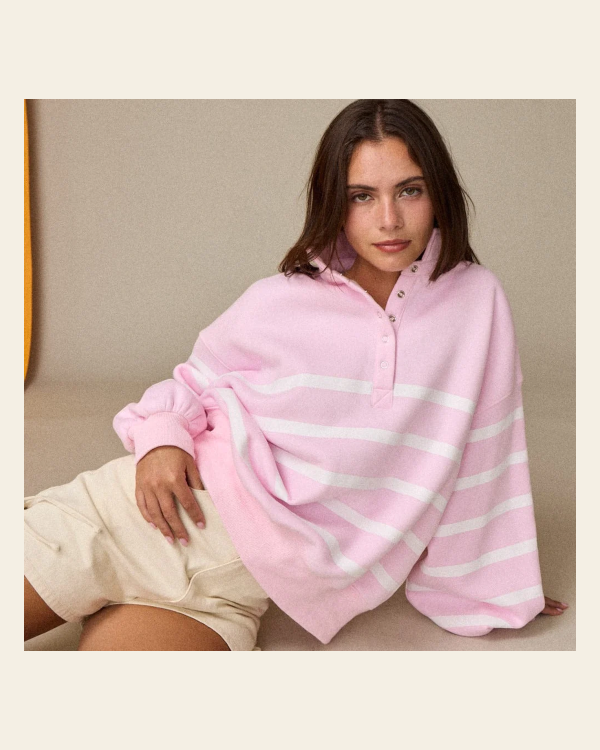 Blush Mode Striped Half Button | Pullover on a warm cream background