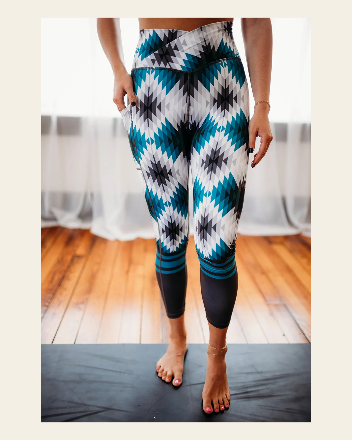 Brayden Crossover Leggings on a warm cream background