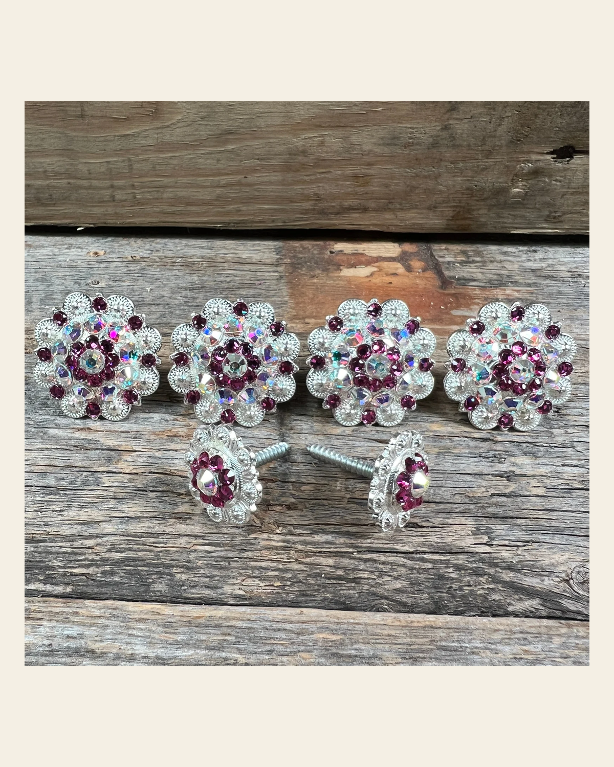 Bright Silver Fuchsia & AB Saddle Conchos on a warm cream background