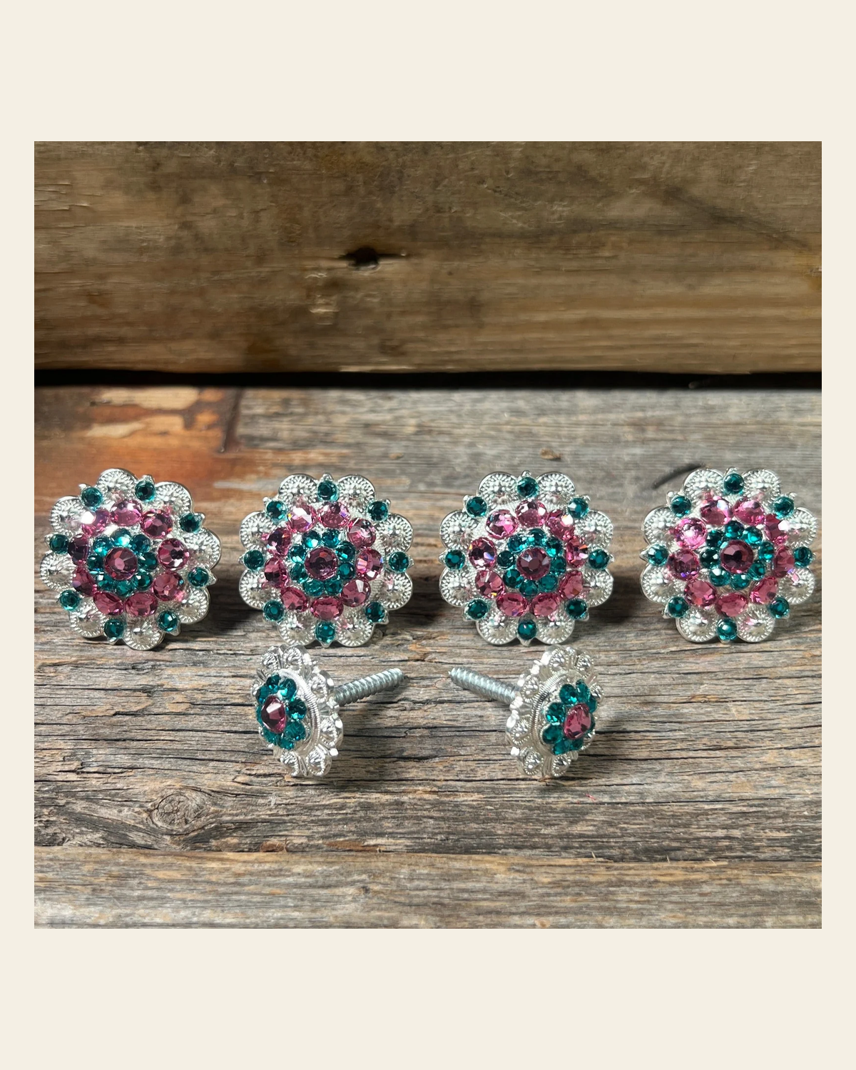 Bright Silver Pink & Teal Saddle Conchos on a warm cream background