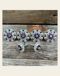 Bright Silver Purple & AB Saddle Conchos on a warm cream background