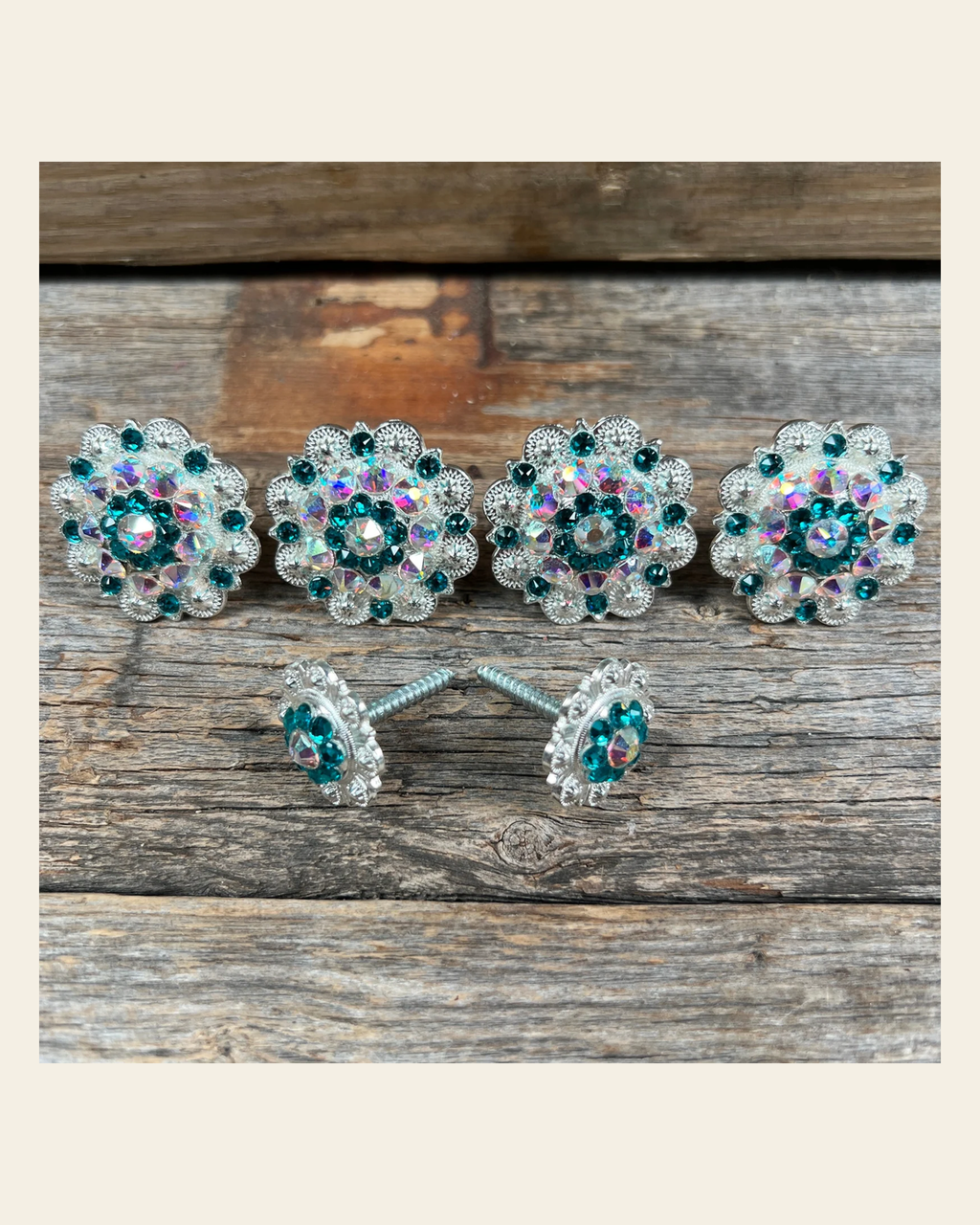 Bright Silver Teal & AB Saddle Conchos on a warm cream background