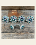 Bright Silver Teal & AB Saddle Conchos on a warm cream background