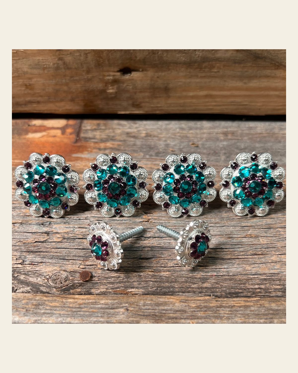 Bright Silver Teal & Amethyst Saddle Conchos on a warm cream background