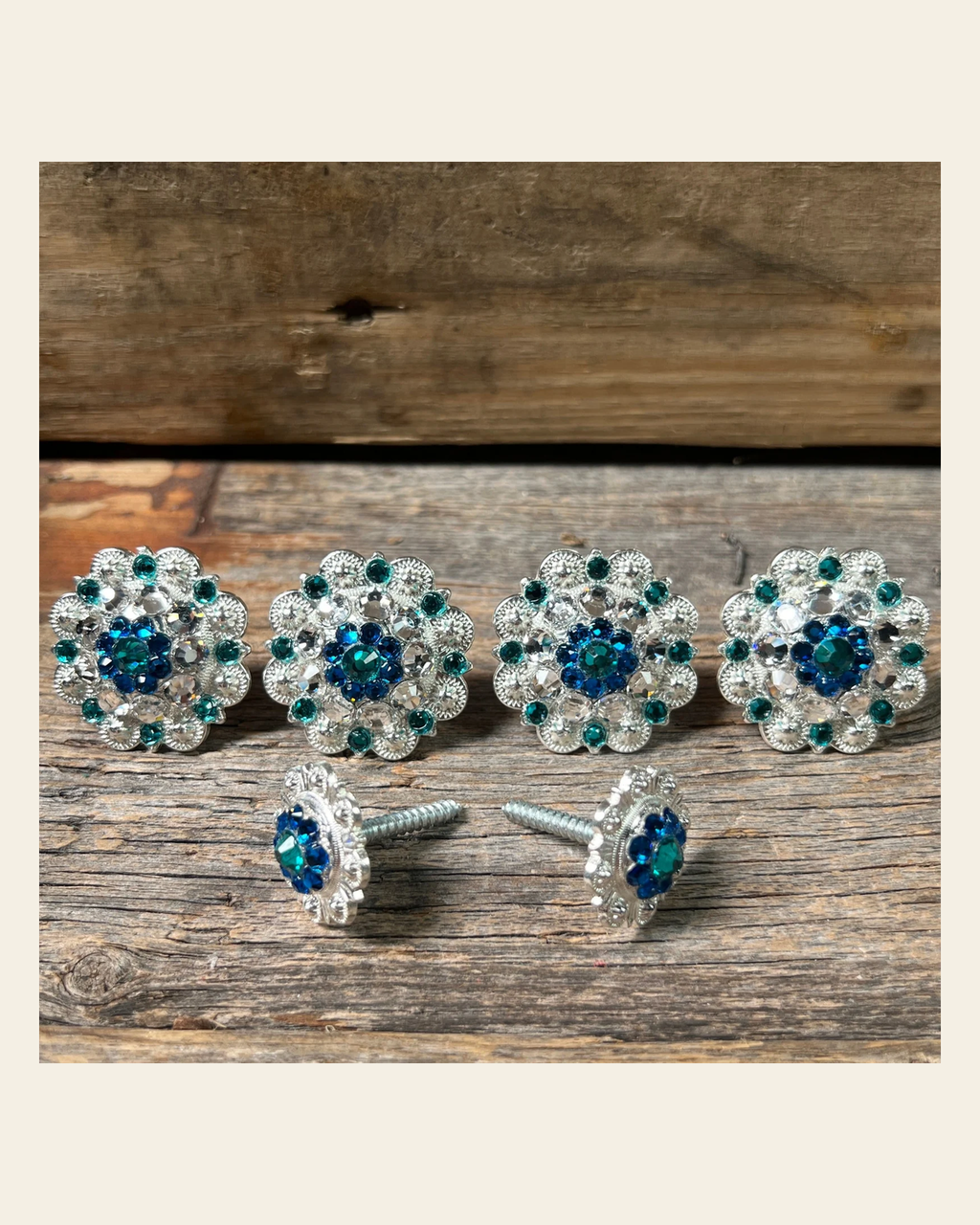Bright Silver Teal Capri & Clear Saddle Conchos on a warm cream background