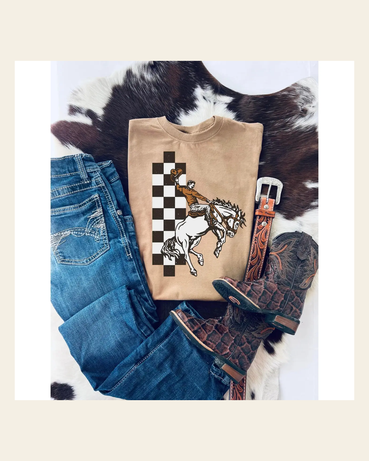 Buckin Checker Kids | Tee on a warm cream background