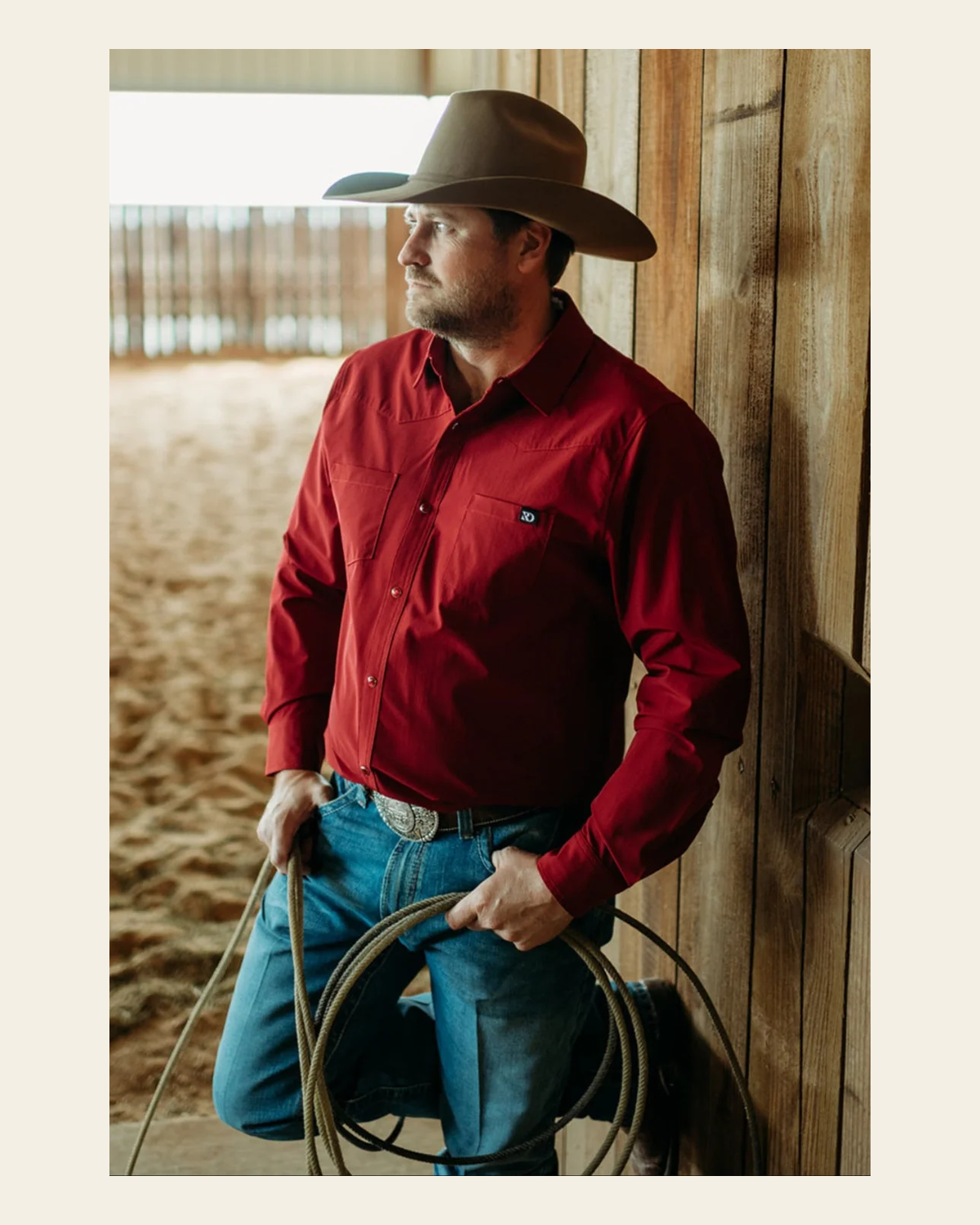 Burgundy Men's Breeze Performance Shirt on a warm cream background