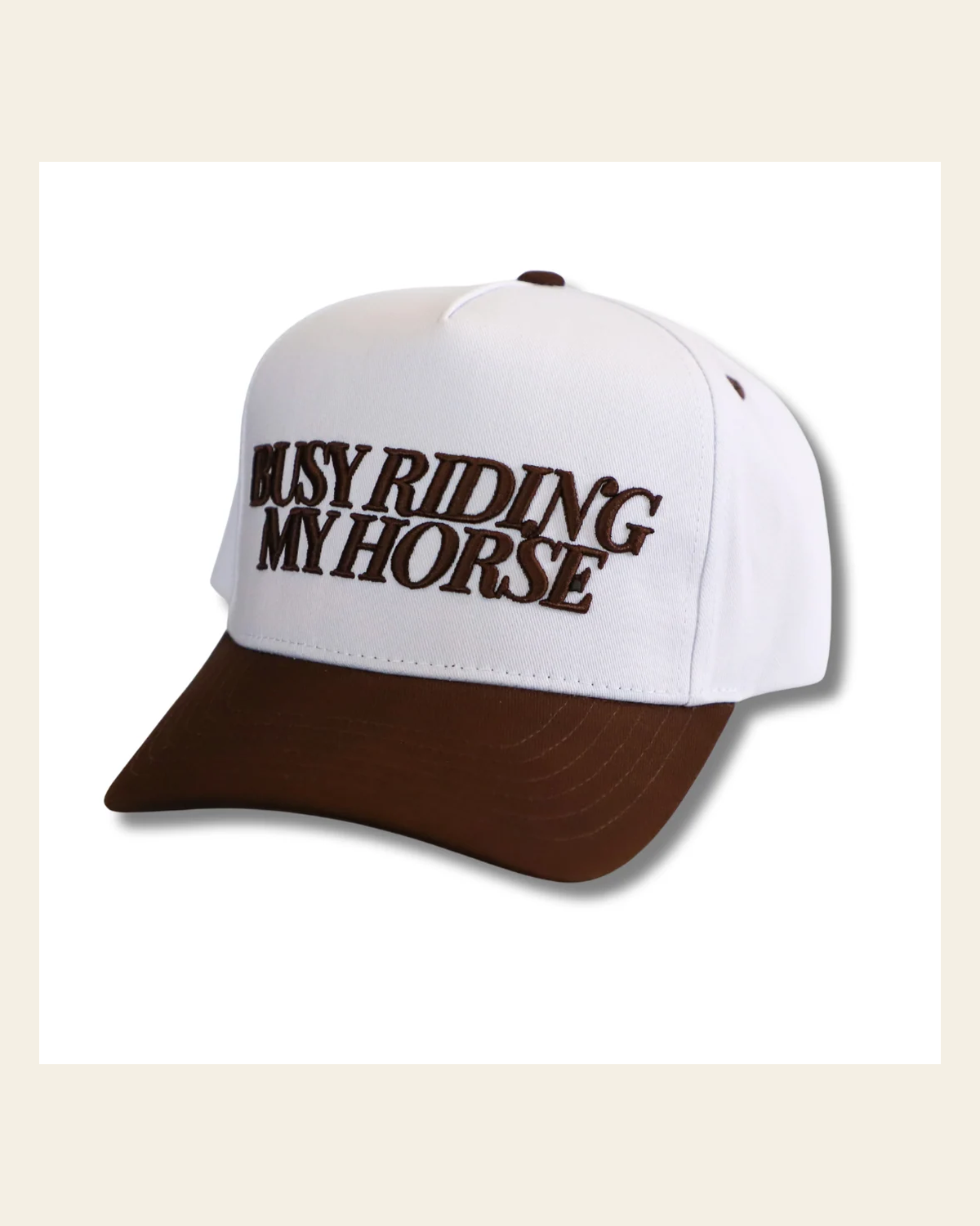 Busy Riding My Horse (chocolate) Hat on a warm cream background