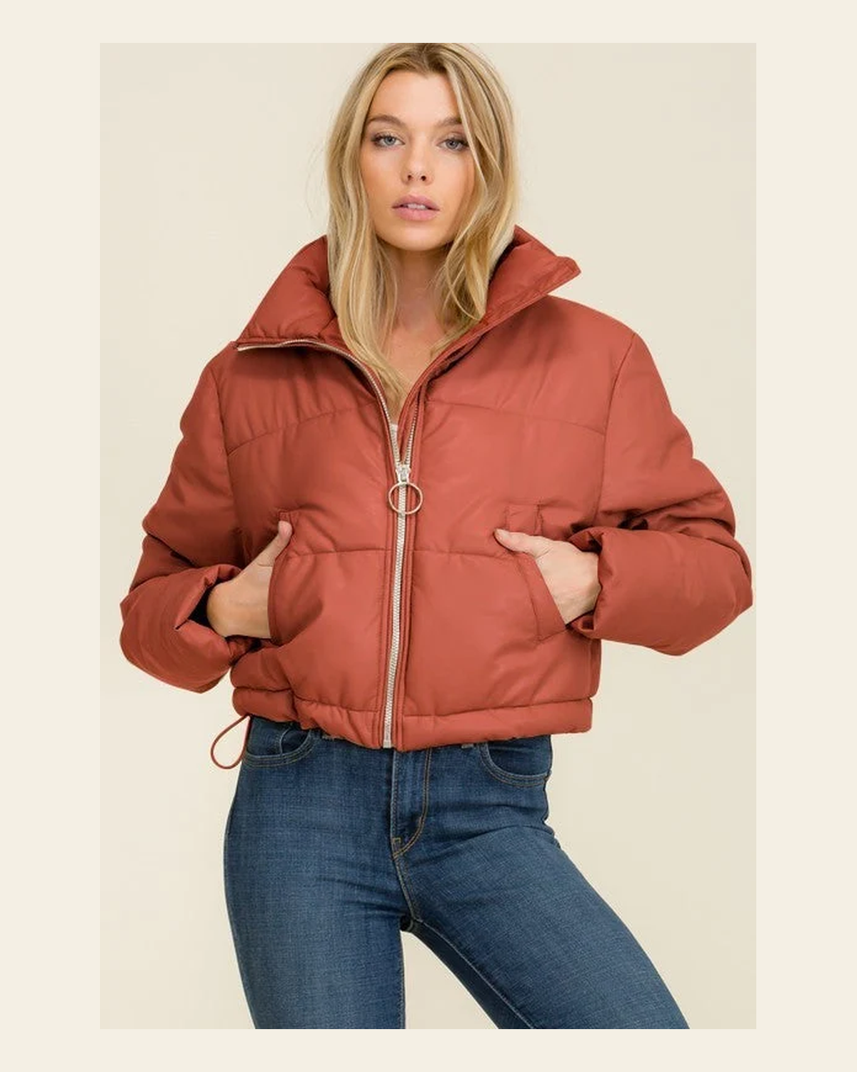 Camel Faux Leather Cropped Puffer Jacket on a warm cream background