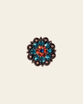 Capri Fire Opal & Teal Copper 1.25" European Crystal Concho on a warm cream background