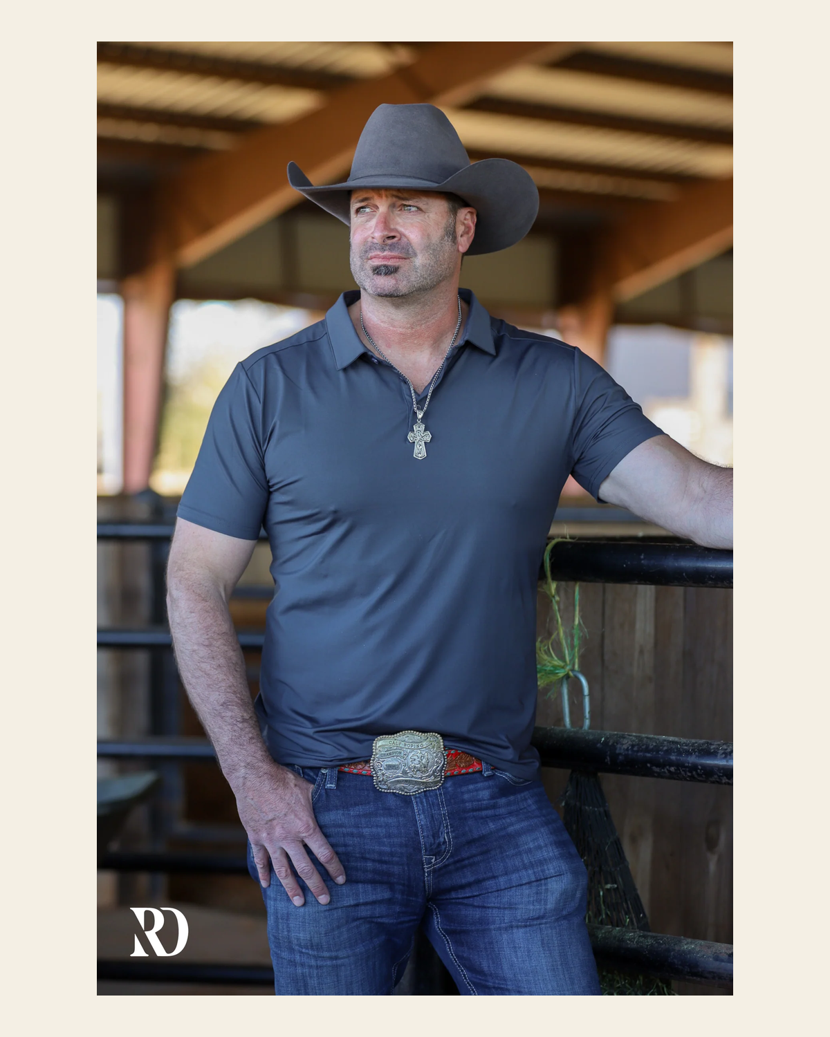 Charcoal Men's Performance Polo on a warm cream background