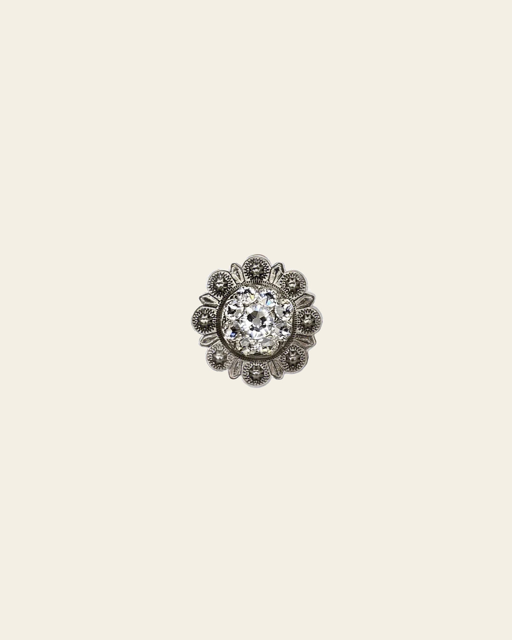 Clear Antique Silver 1" European Crystal Concho on a warm cream background