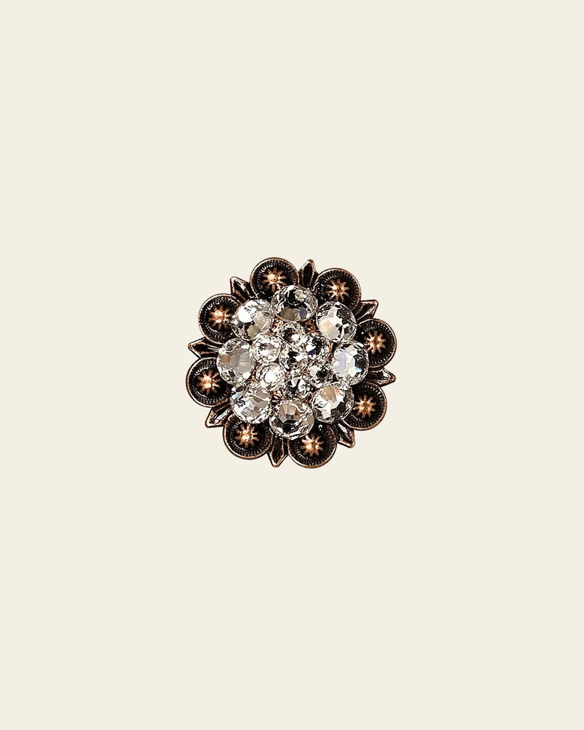 Clear Copper 1.25" European Crystal Concho on a warm cream background