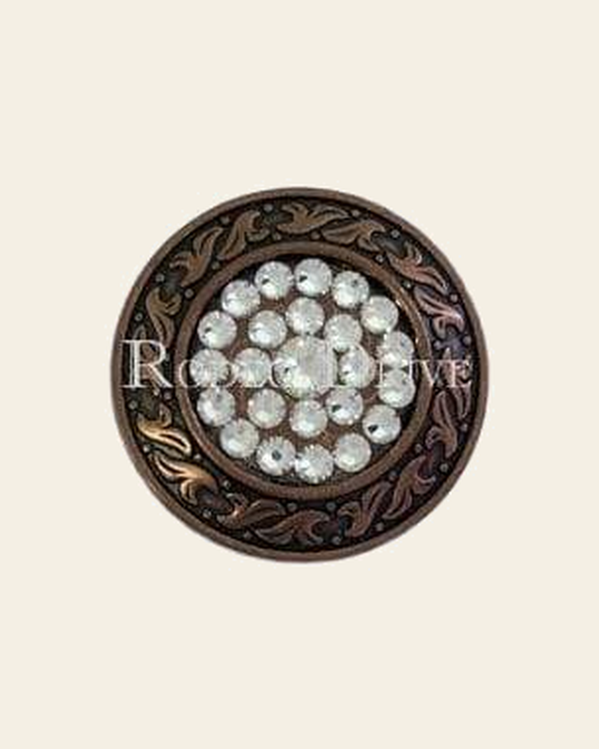 Clear Copper 1.5" Disc European Crystal Concho- on a warm cream background