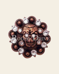 Clear Copper 1.75" Skull European Crystal Concho on a warm cream background