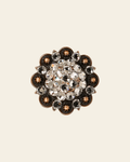 Clear Copper 2" European Crystal Concho on a warm cream background
